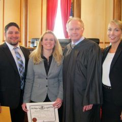 New admittee Jacob Lawson, new admittee Megan Cottington, Chief Justice Thomas L. Kilbride and speaker and ISBA Assembly member Jessica Hegarty.
