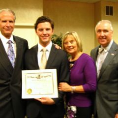 Attorney Gerald Kielian, his wife Galey with their son, new admittee Jordan Kielian, and ISBA 2nd Vice President Umberto S. Davi