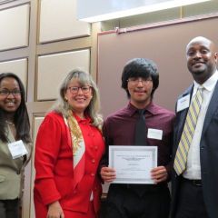 Event co-chairs Kenya Jenkins-Wright (left) and David Kadzai (right) with ISBA President-elect Paula H. Holderman and 3rd place winner John Moreno of Jane Addams High School.