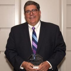 ISBA President Richard D. Felice receives the NIU Alumnus of the Year Award for outstanding achievements in his career, demonstrated service to the NIU College of Law, demonstrated service to his community, and professional integrity.