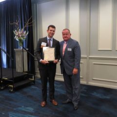 George L. Schoenbeck, III, Board of Governors Award recipient, and President Russell Hartigan
