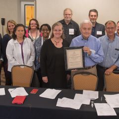 Patrick Driscoll receives an award
