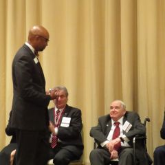 Vincent Cornelius presents Marshall Hartman his award
