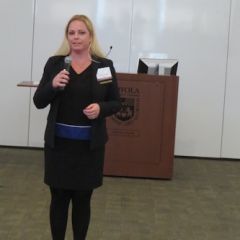 Julie Johnson delivering introductory remarks