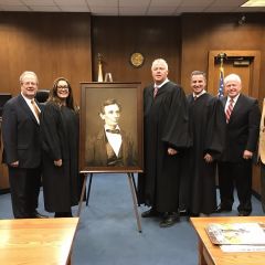 A high-quality reproduction of a famous Abraham Lincoln photograph was presented to the Christian County Courthouse on November 30 in Taylorville. 